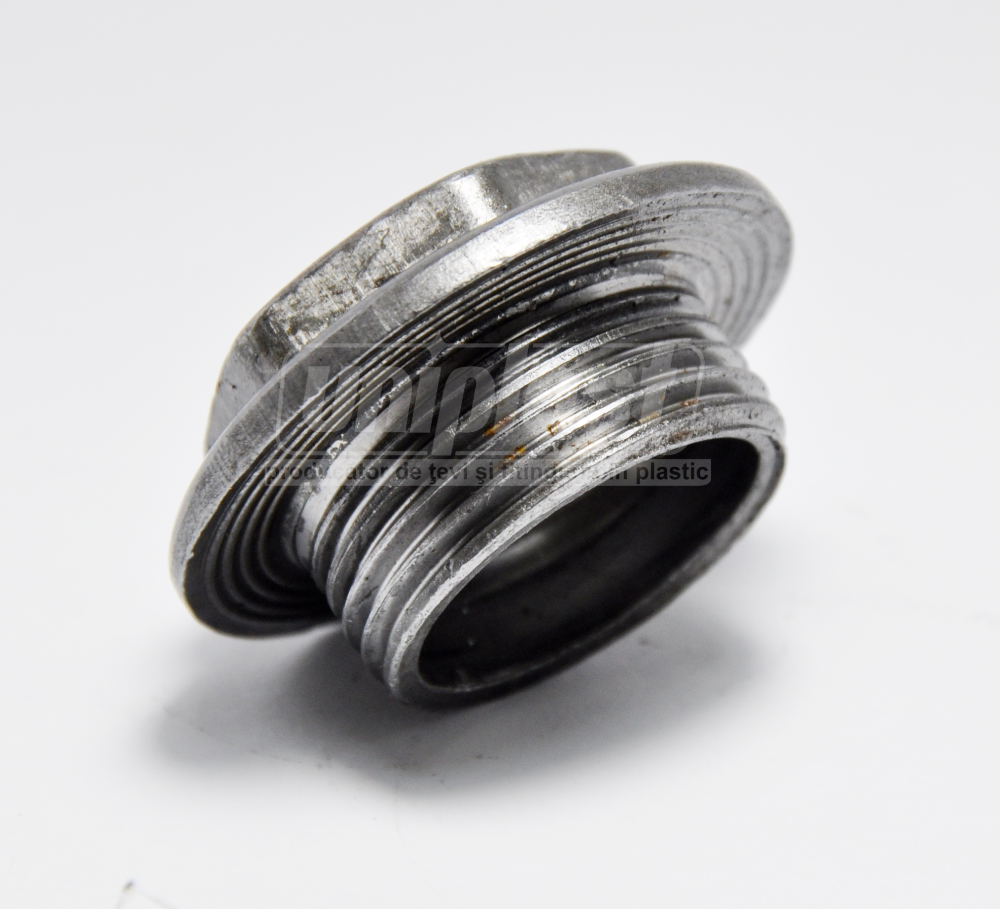 Заглушка проходная для радиатора D. 1" x 1/2" правая чугун ST